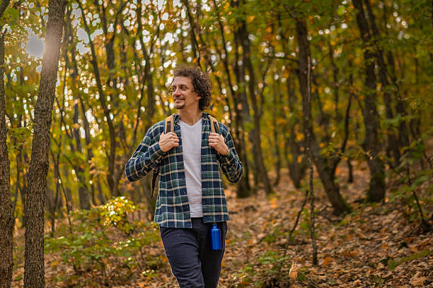 Person walking briskly on an outdoor trail